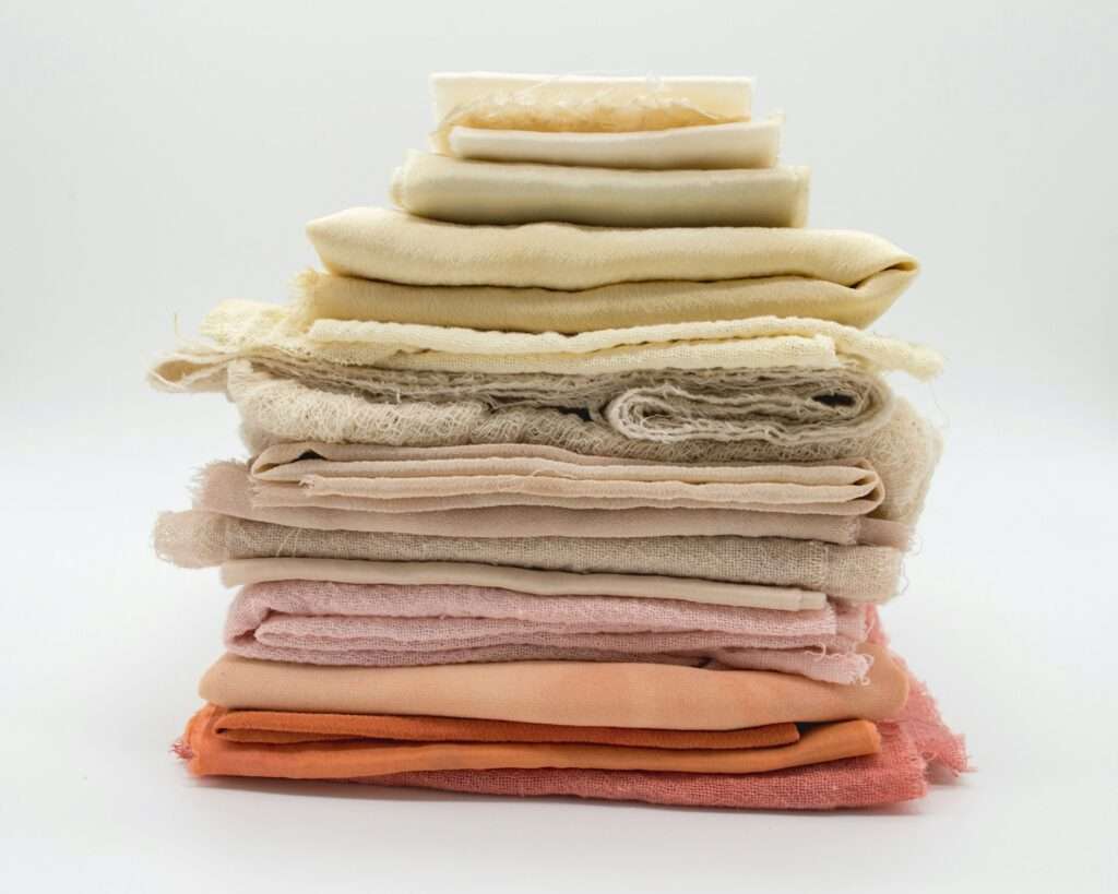 Pile of cloth on white surface