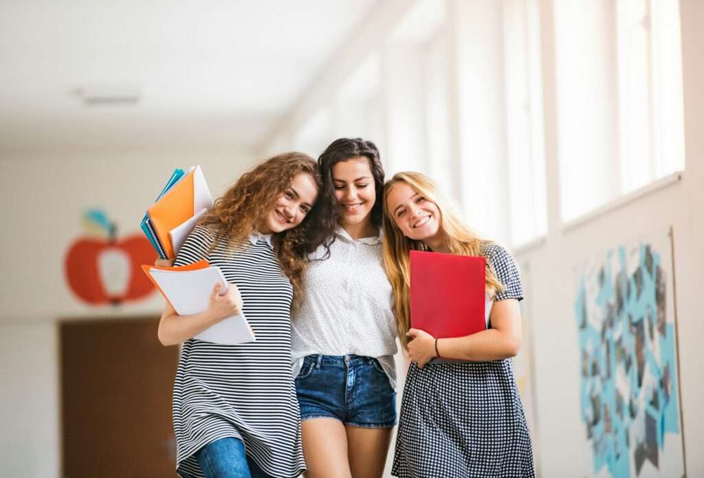 Three women standing