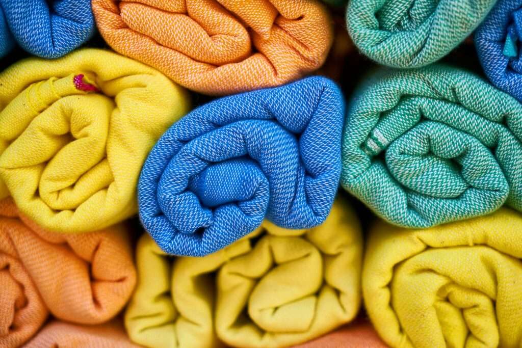 Blue and yellow knit textile towels