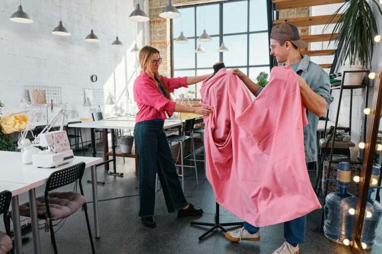 A man and a woman holding a pink cloth image