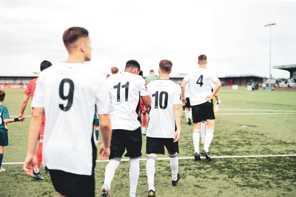 Soccer players walking