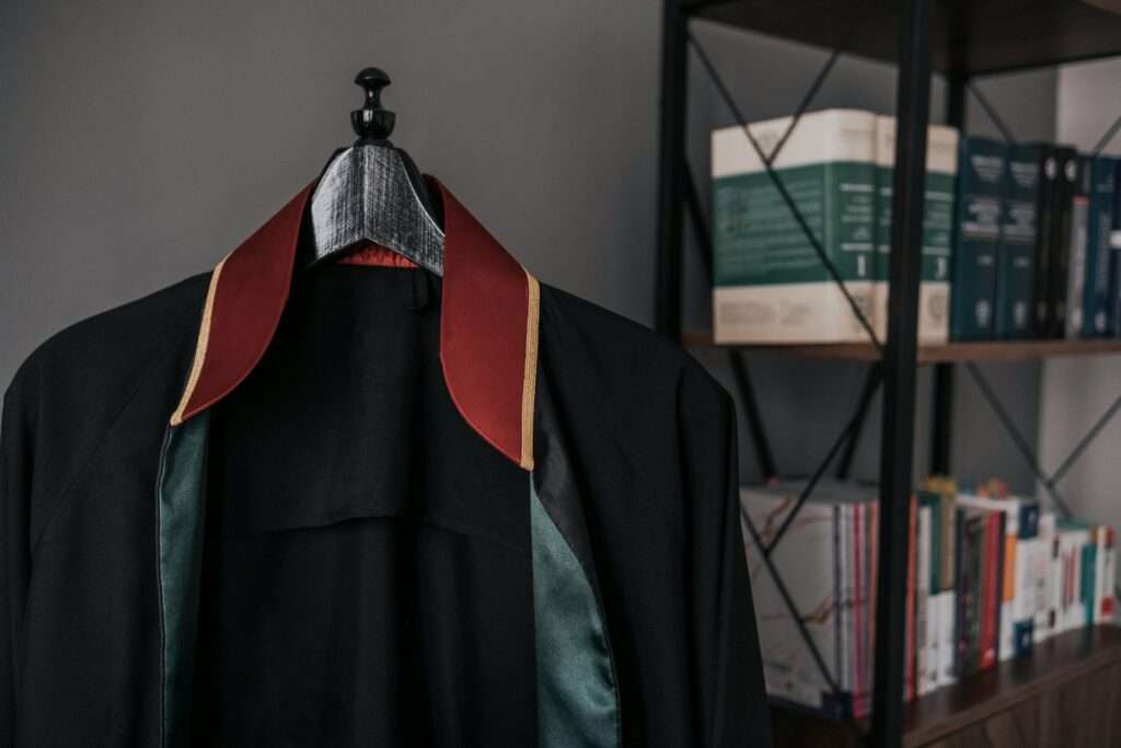 A coat hanging on a wall image