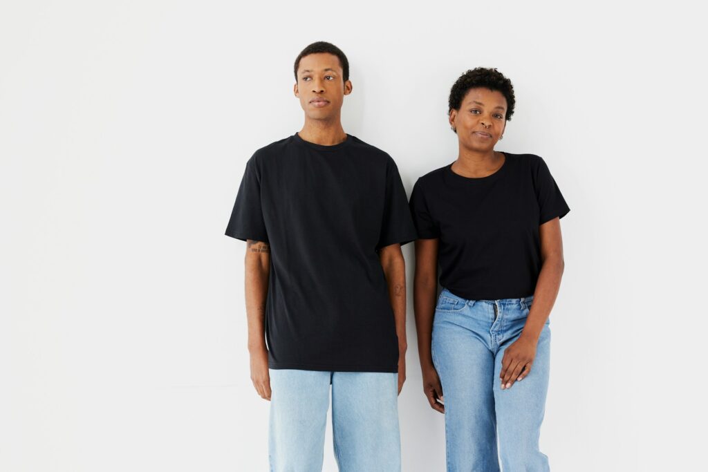 Two person wearing black shirt image